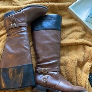 Brow riding boots
